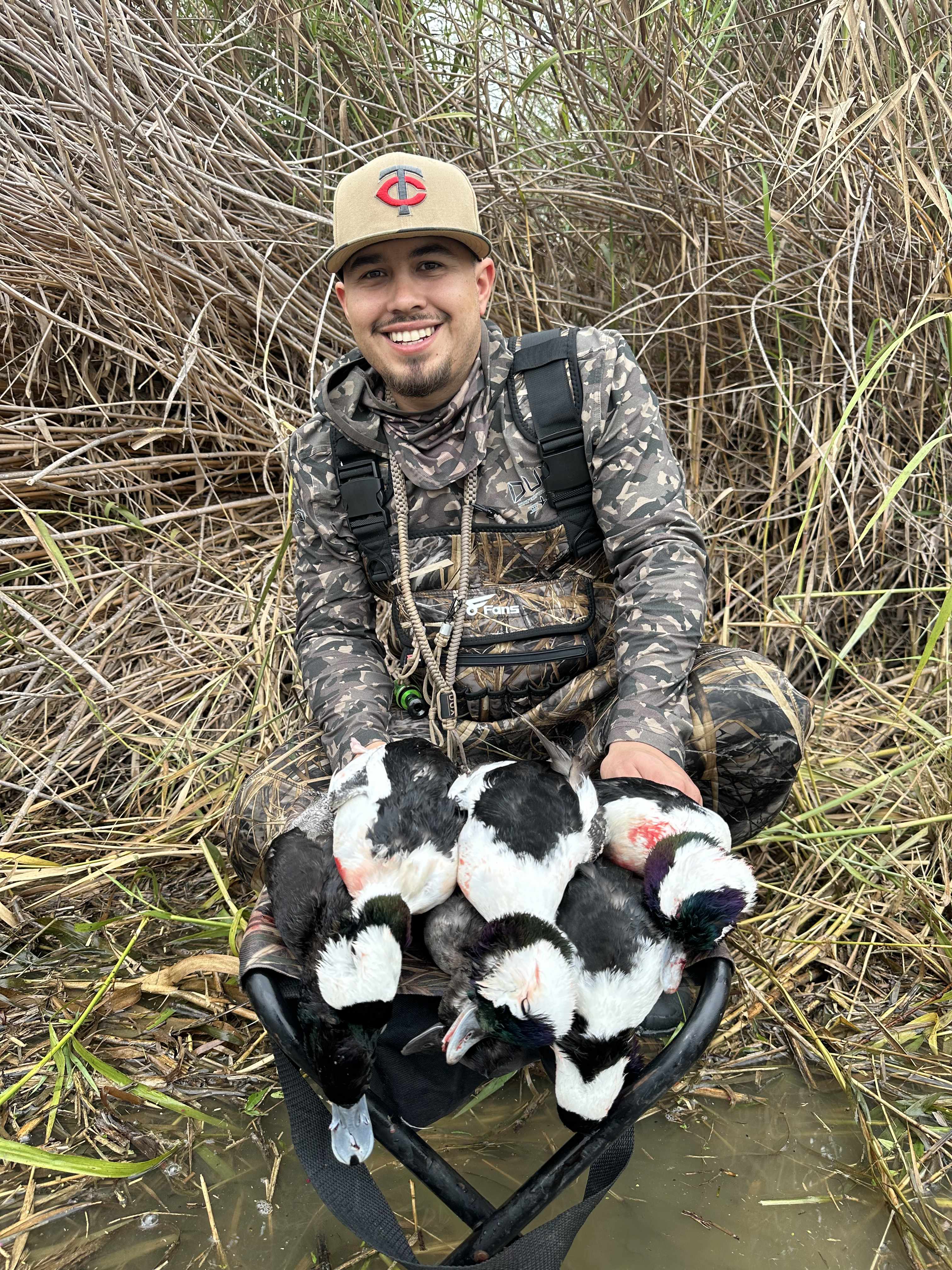Hunter with a limit of South Texas ducks